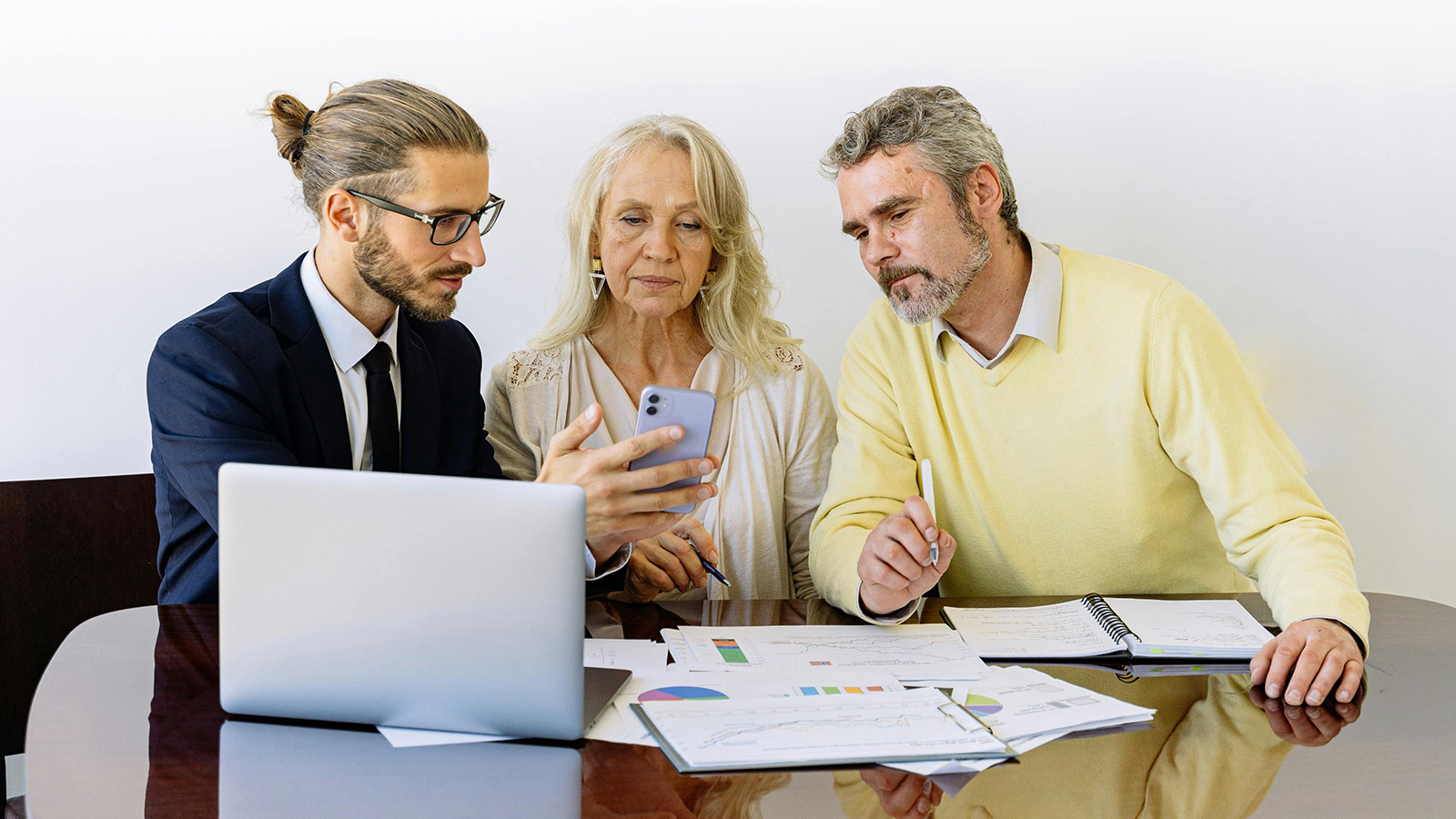 Older couple meeting with investment advisor 