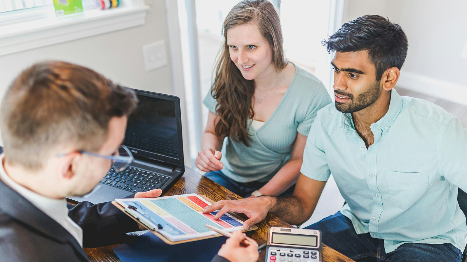 Couple receiving responsible investing advice 