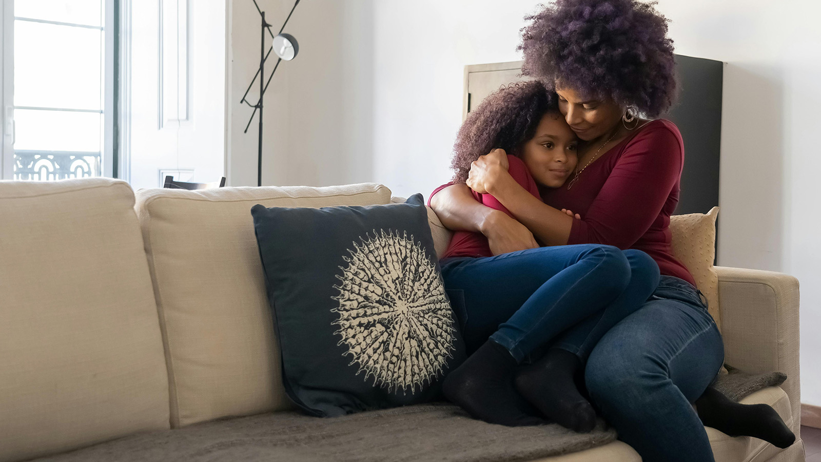 Mother and daughter on the couch 