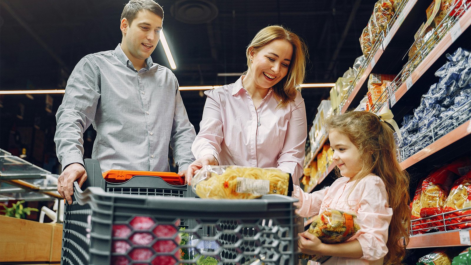 Young family shopping for groceries 