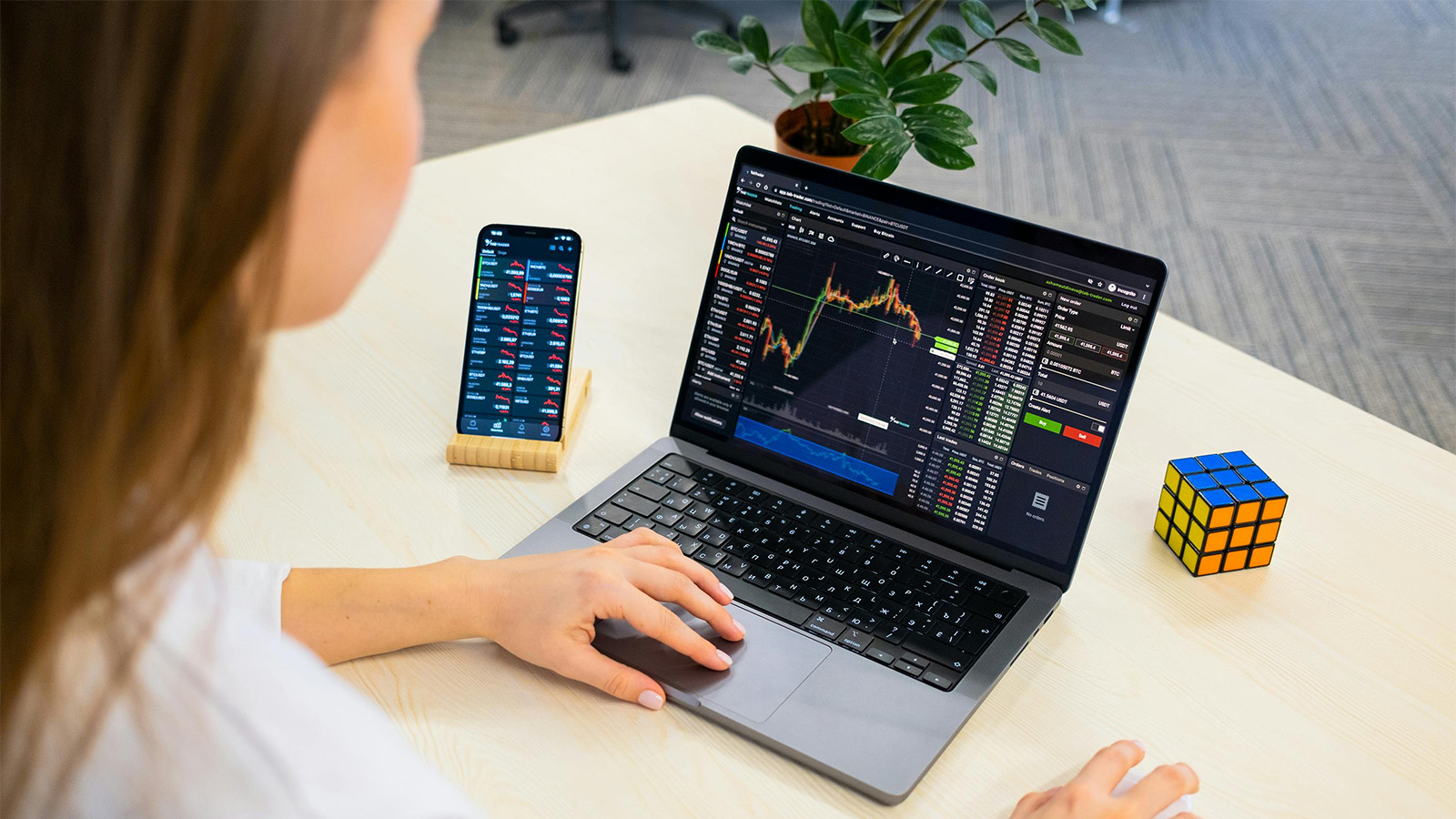 Young woman looking at her investments online