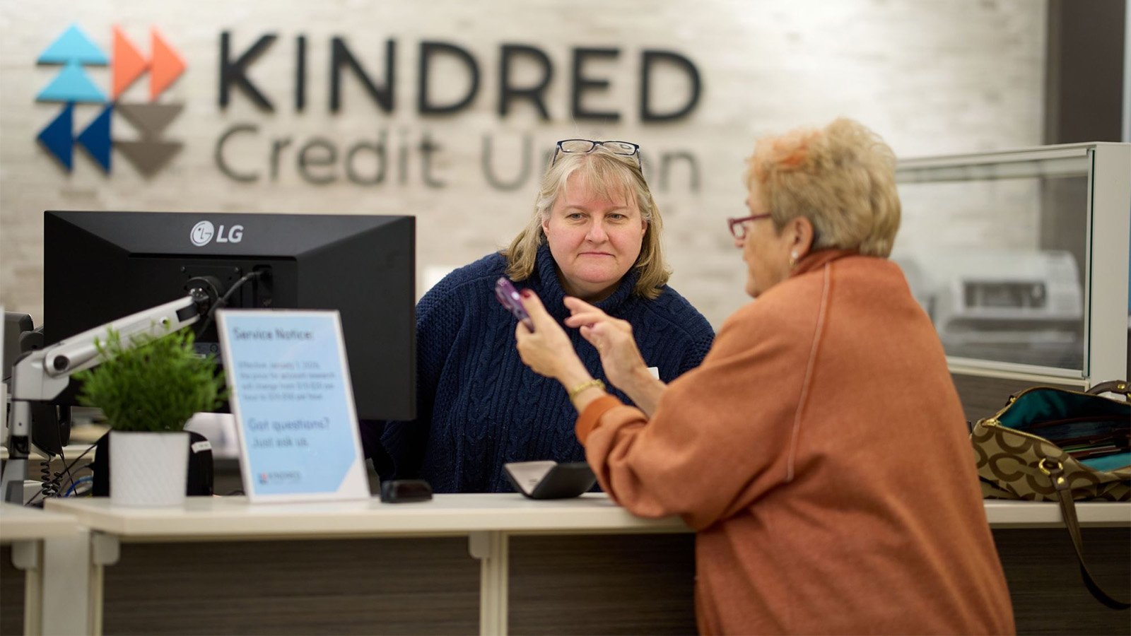 Member at a Kindred branch kiosk